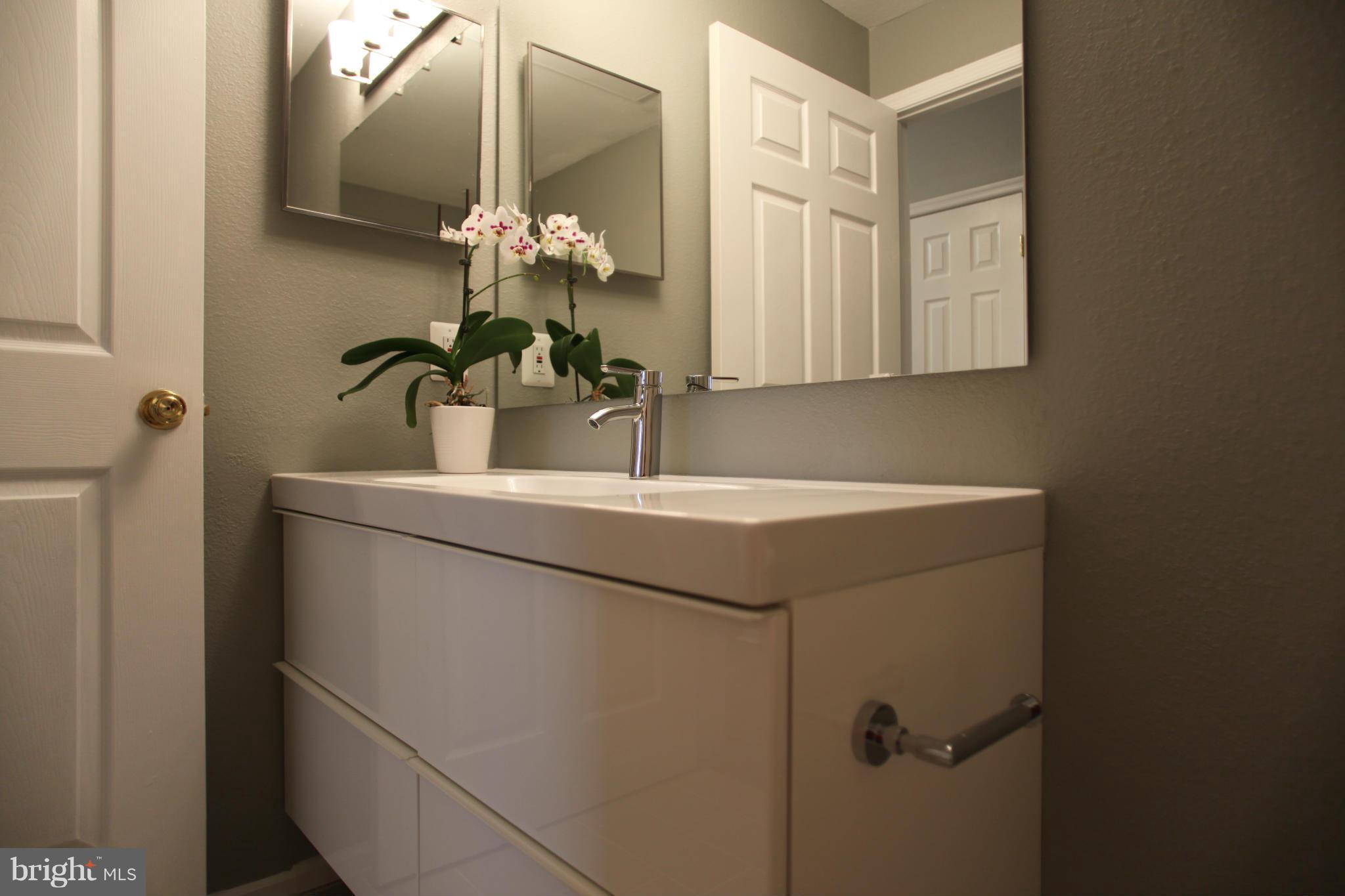 1521 Spring Gate Dr., Unit 10202 McLean, VA 22102 - Photo 7 of 30 Floating vanity with lots of storage