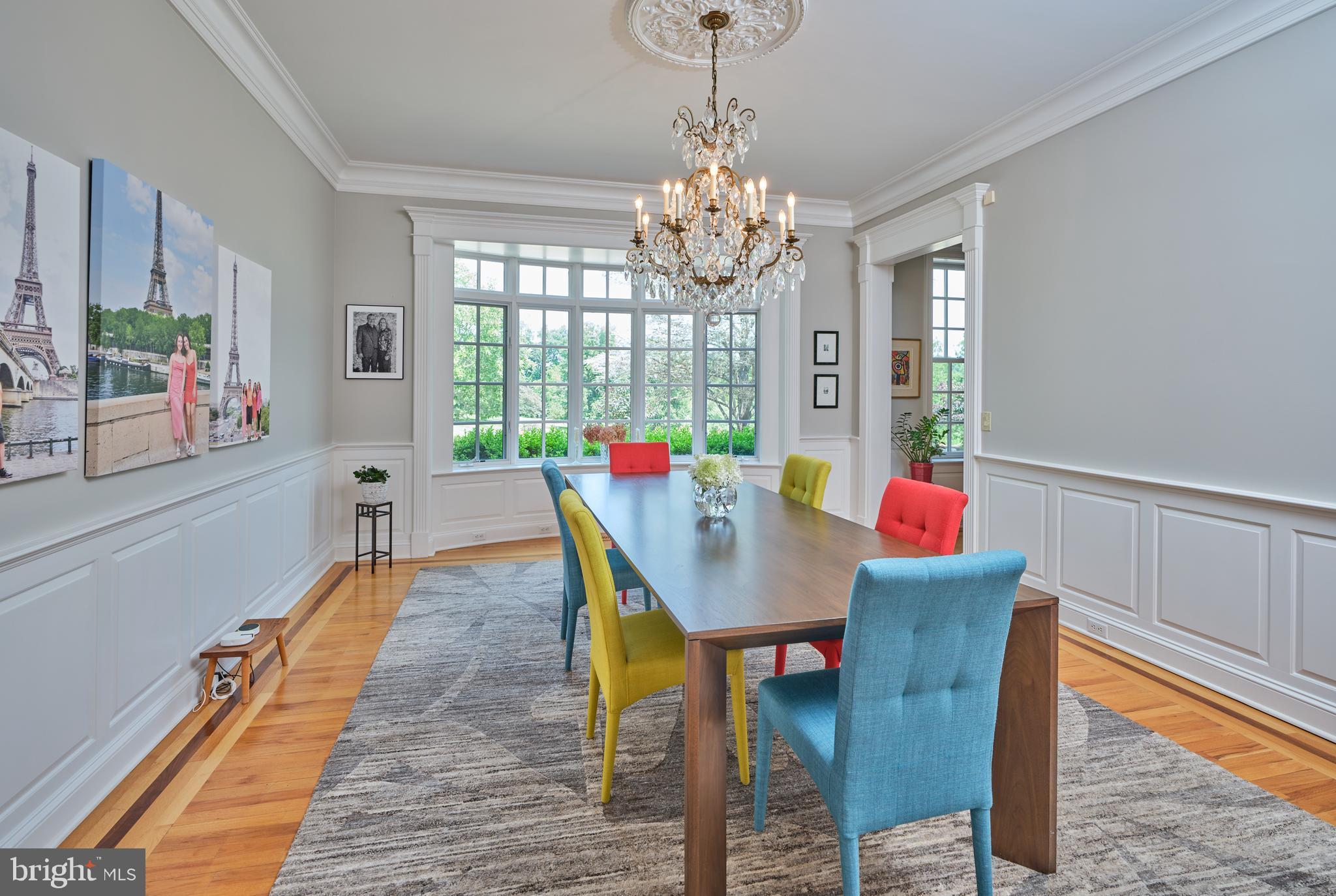 6020 Atkinson Road New Hope, PA 18938 - Photo 16 of 87 a view of a dining room with furniture a chandelier and wooden floor