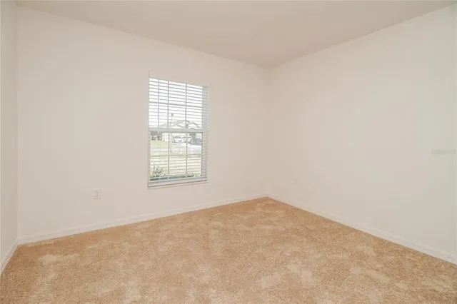 an empty room with a window