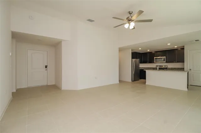 a view of a kitchen with a microwave and a stove