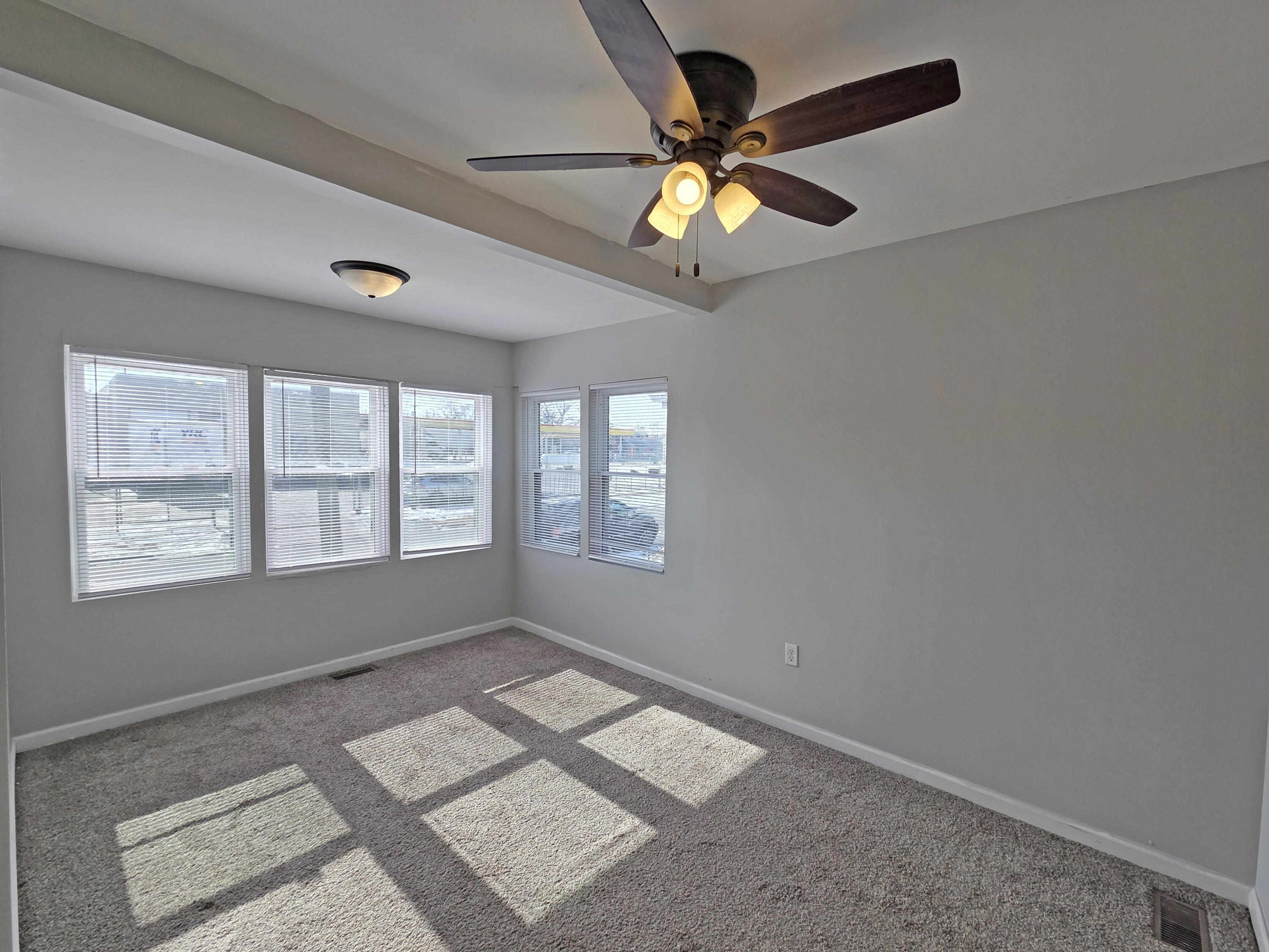 1127 164th Place Hammond, IN 46320 - Photo 20 of 34 a view of an empty room with a window