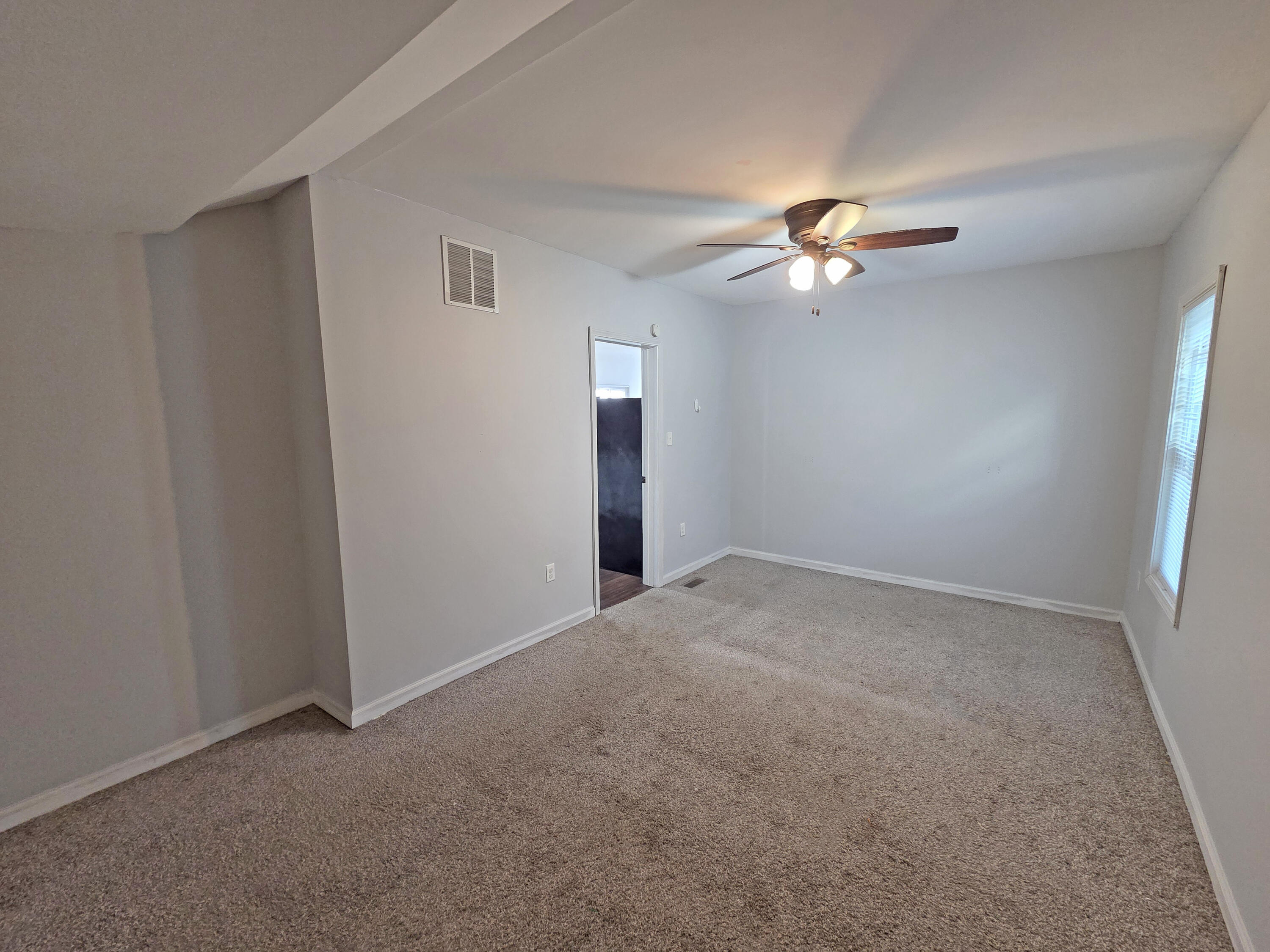 1127 164th Place Hammond, IN 46320 - Photo 24 of 34 a view of a big room with chandelier fan