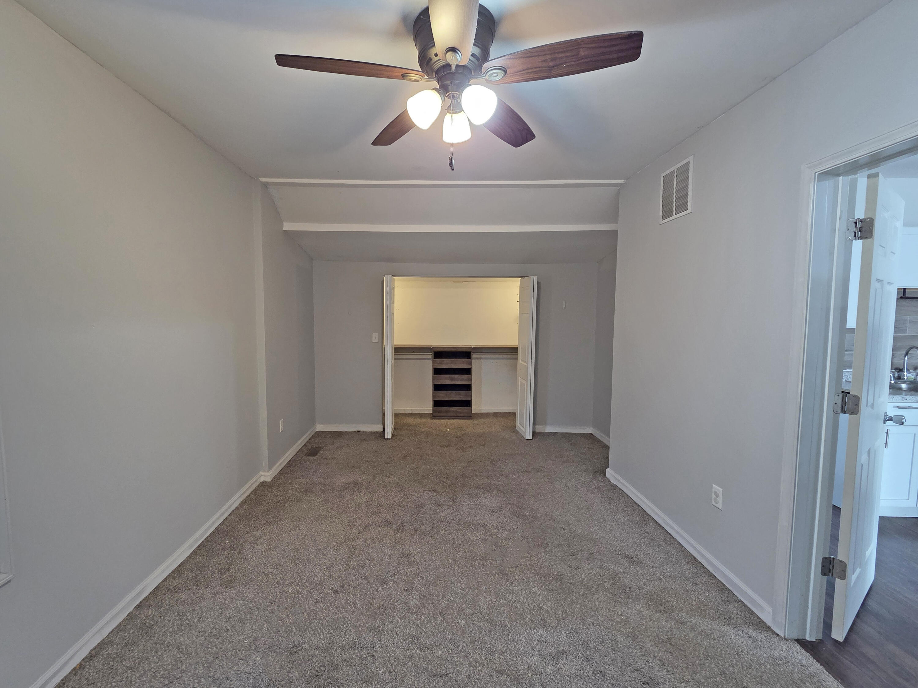 1127 164th Place Hammond, IN 46320 - Photo 25 of 34 a view of an empty room with a window