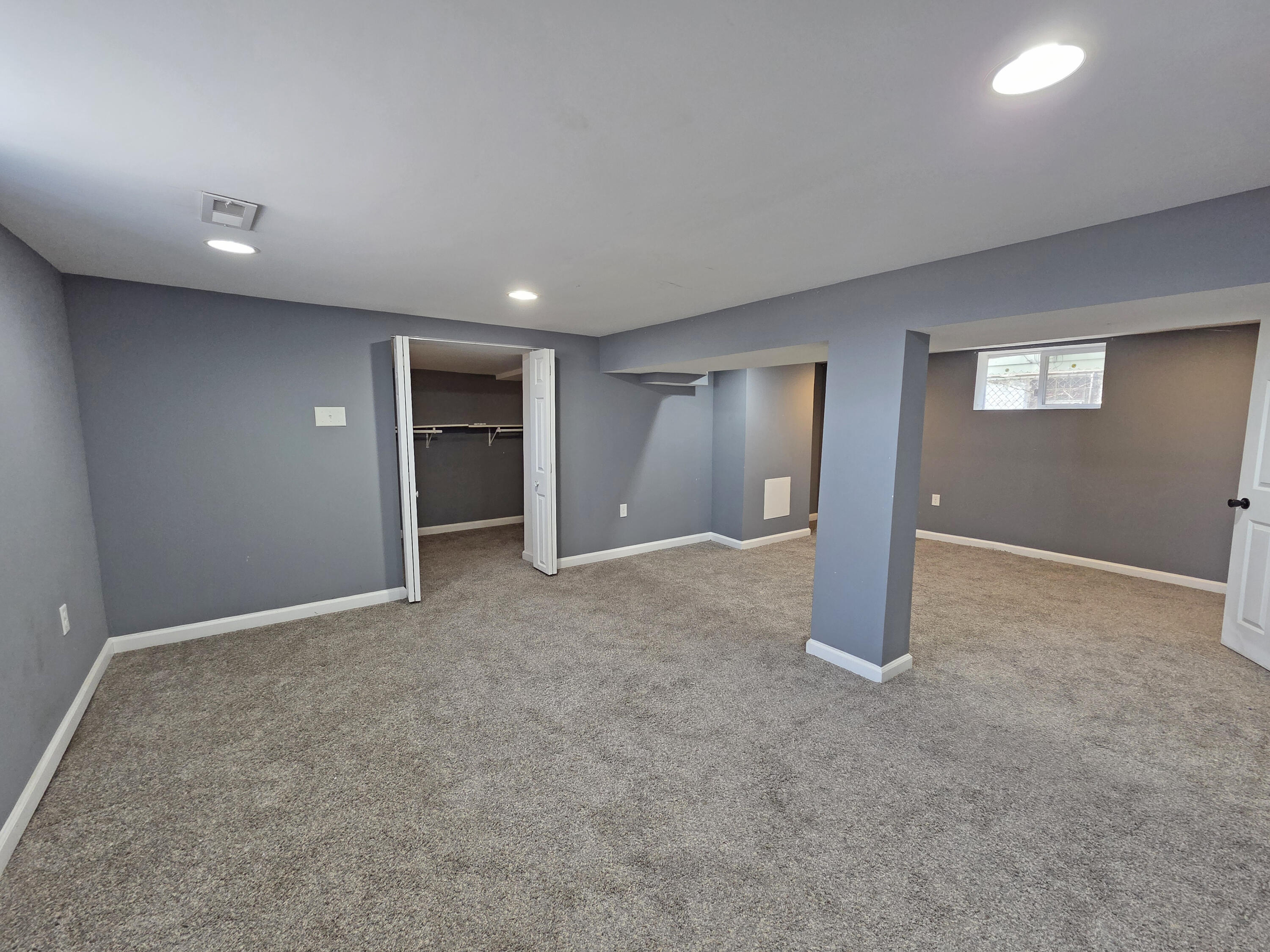1127 164th Place Hammond, IN 46320 - Photo 28 of 34 a view of an empty room with window and closet area