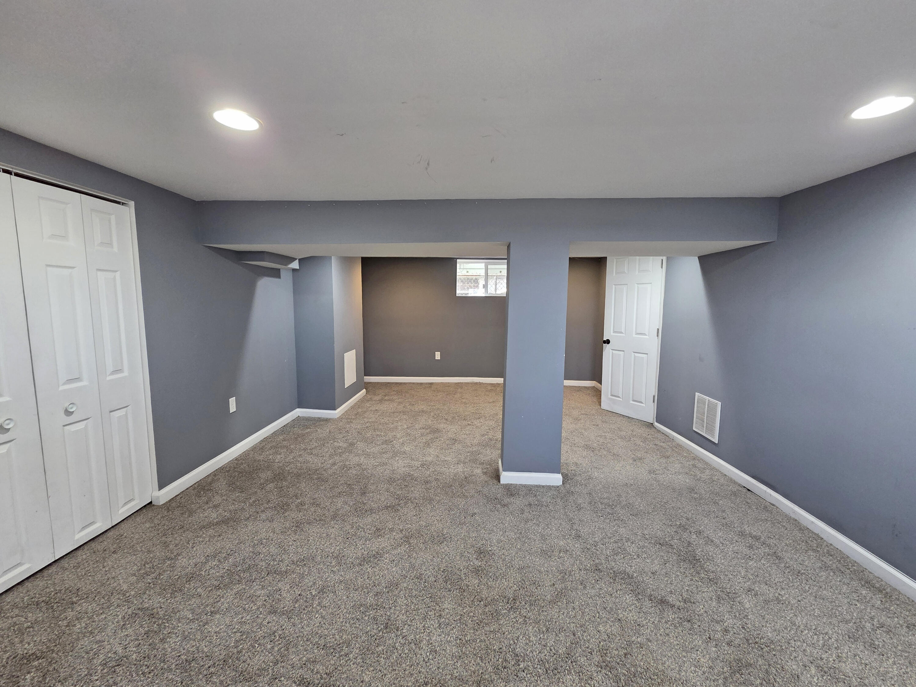 1127 164th Place Hammond, IN 46320 - Photo 29 of 34 a view of a big room with closet and windows
