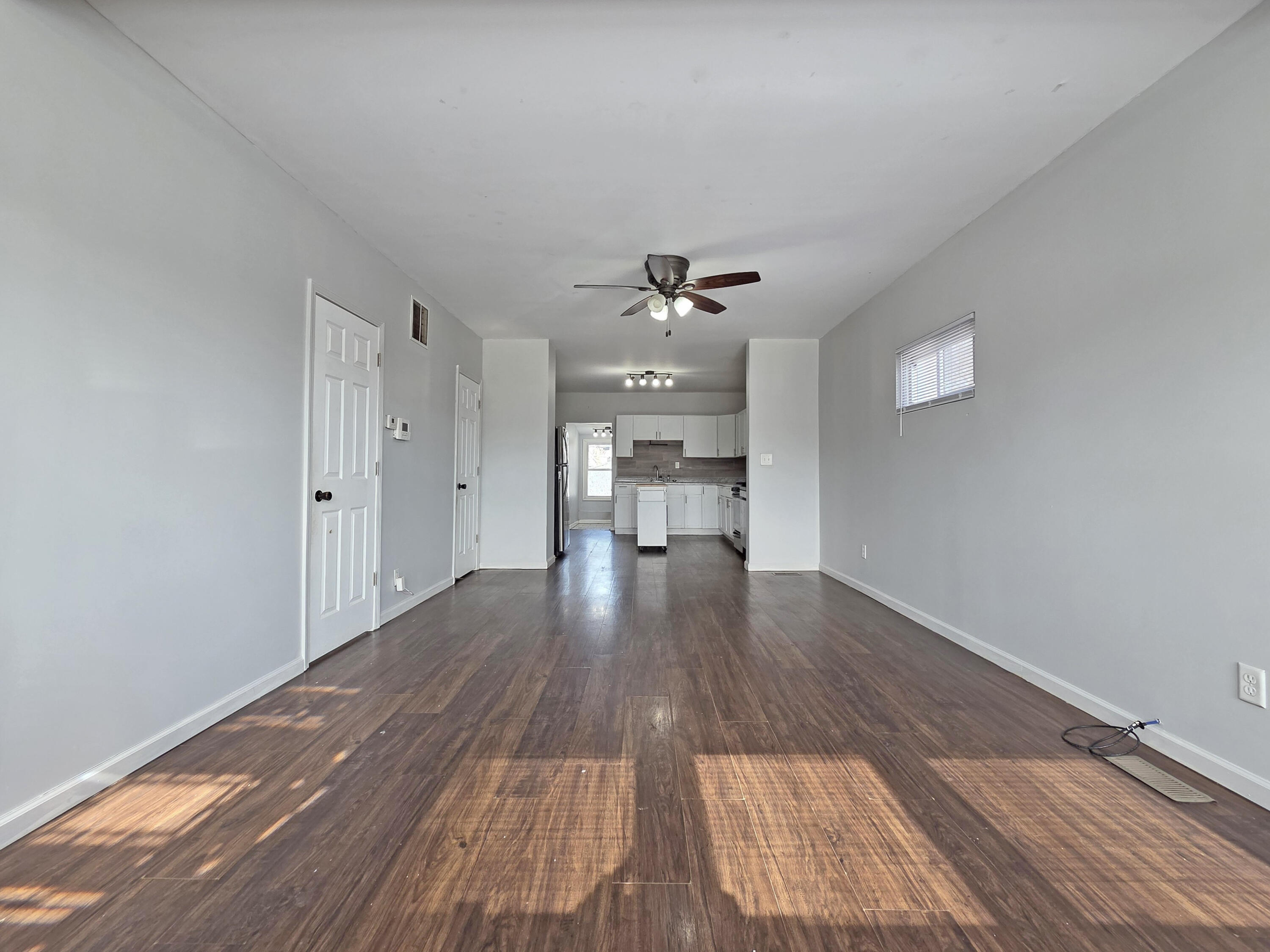 1127 164th Place Hammond, IN 46320 - Photo 10 of 34 a view of empty room with wooden floor