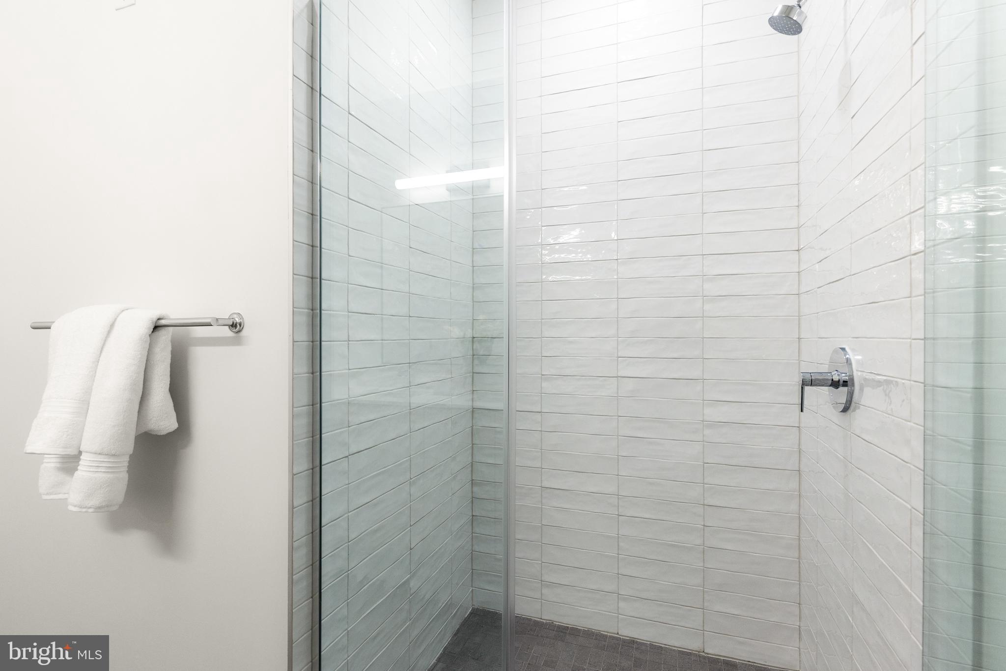7175 12th Street Northwest, Unit 614 Washington, DC 20012 - Photo 8 of 23 a bathroom with a shower
