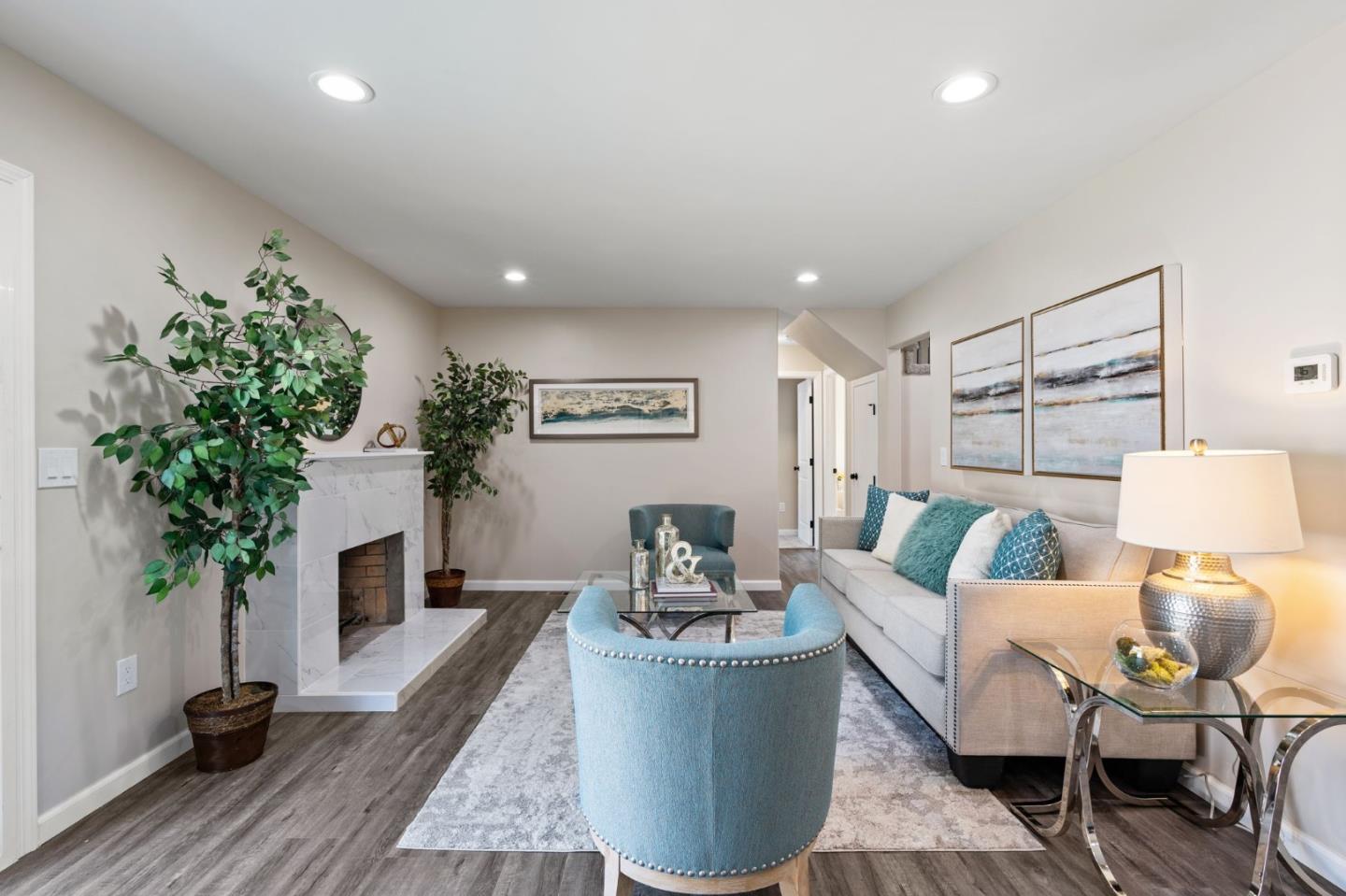 2178 Corktree Lane San Jose, CA 95132 - Photo 11 of 41 a living room with furniture and a potted plant