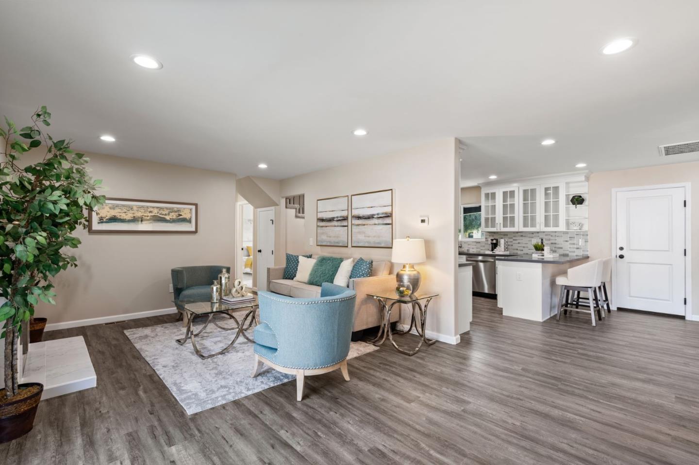 2178 Corktree Lane San Jose, CA 95132 - Photo 12 of 41 a view of a dining room with furniture and wooden floor