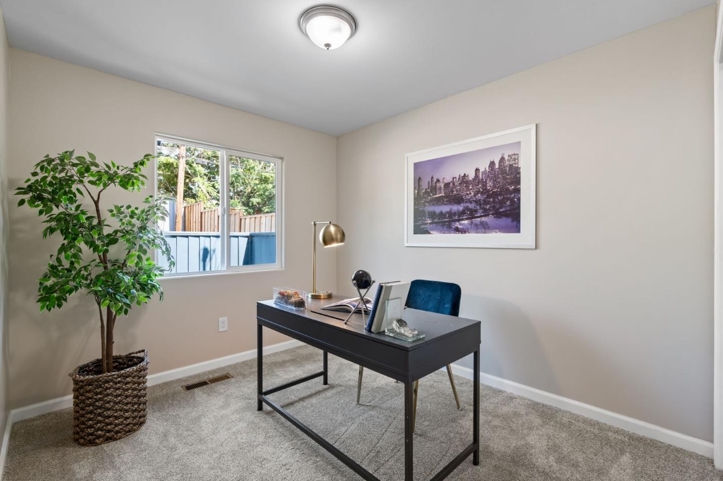2178 Corktree Lane San Jose, CA 95132 - Photo 17 of 41 a living room with furniture and a potted plant
