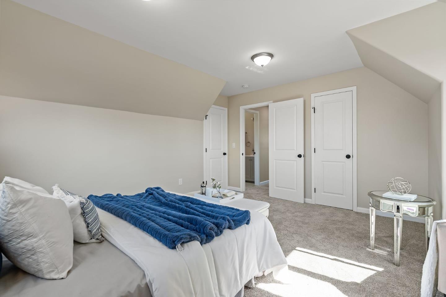 2178 Corktree Lane San Jose, CA 95132 - Photo 23 of 41 a bedroom with a bed and a chair