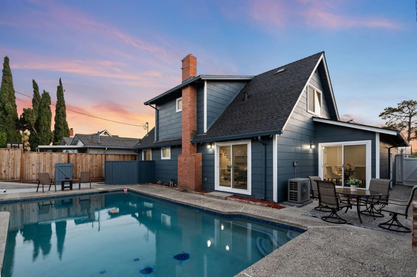 2178 Corktree Lane San Jose, CA 95132 - Photo 32 of 41 a view of a house with swimming pool next to a yard