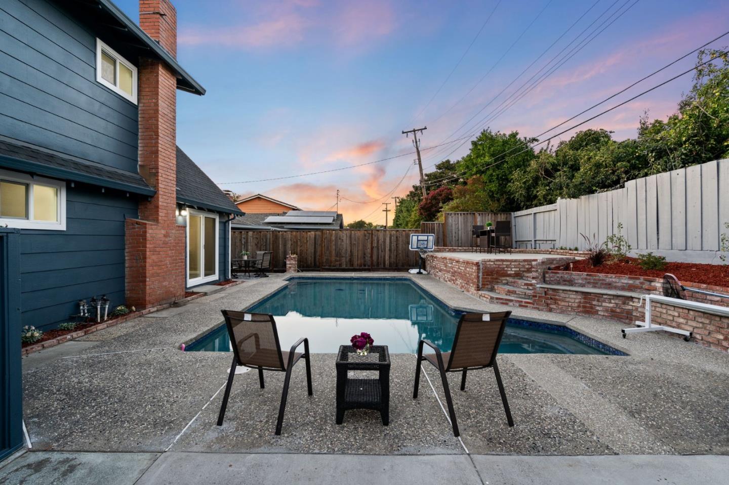 2178 Corktree Lane San Jose, CA 95132 - Photo 34 of 41 a backyard of a house with table and chairs