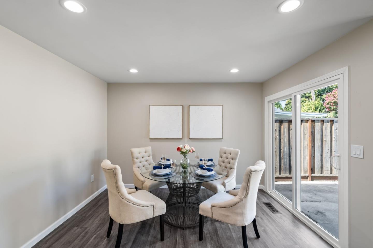 2178 Corktree Lane San Jose, CA 95132 - Photo 6 of 41 a view of a dining room with furniture and wooden floor
