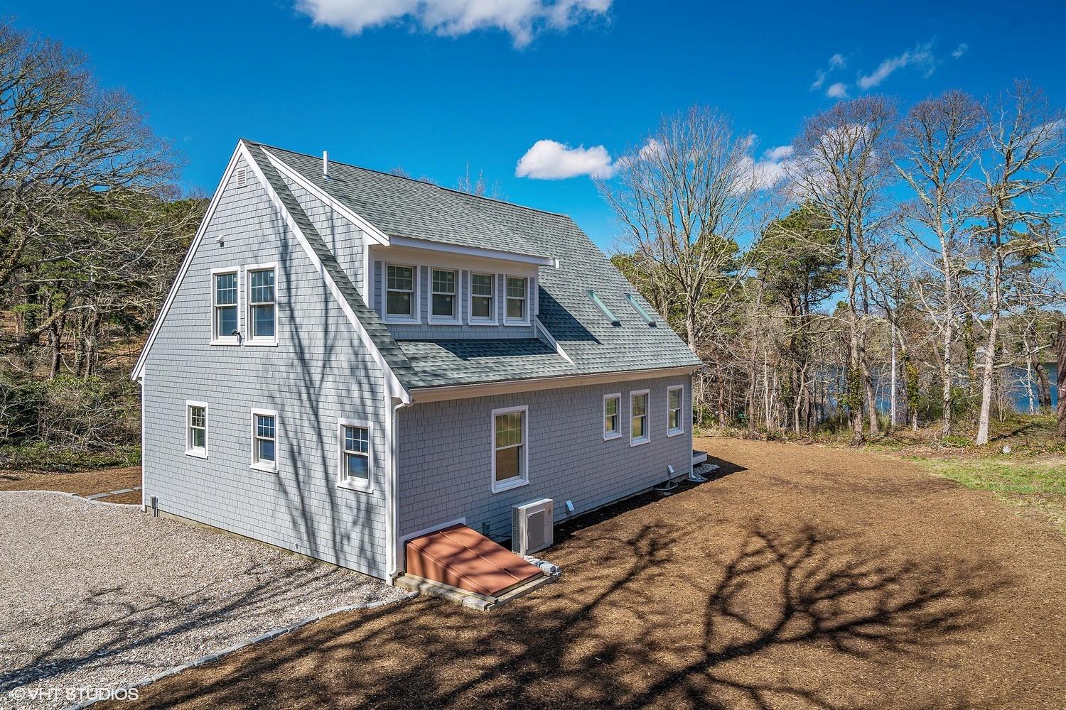78 Stillwater Road Chatham, MA 02633 - Photo 2 of 18 a view of a house with a yard