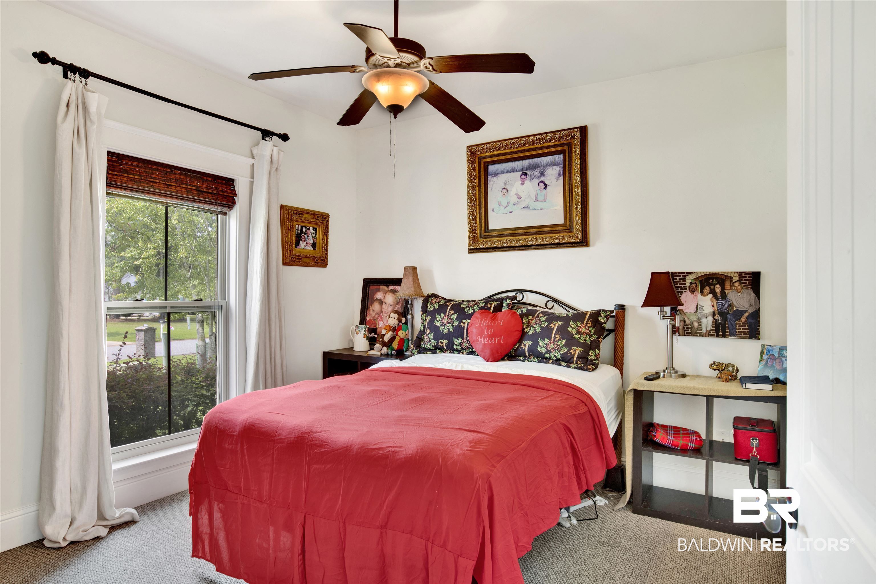 9240 Bay Point Drive Elberta, AL 36530 - Photo 16 of 22 Bedroom featuring ceiling fan and light colored carpet