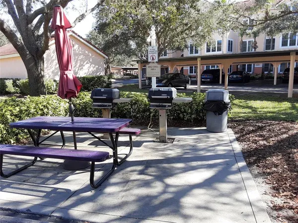 a view of an outdoor space and tennis court