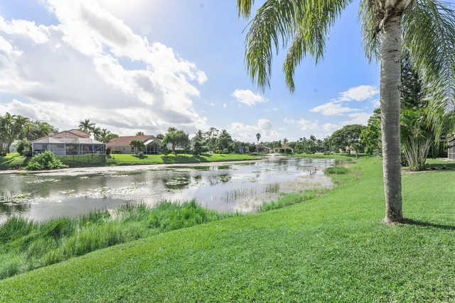 a view of lake with a city