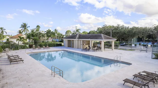 swimming pool view with sitting space
