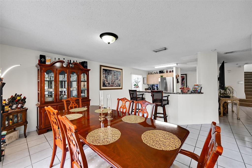17332 Southwest 18th Street Miramar, FL 33029 - Photo 12 of 43 a view of a dining room and livingroom view