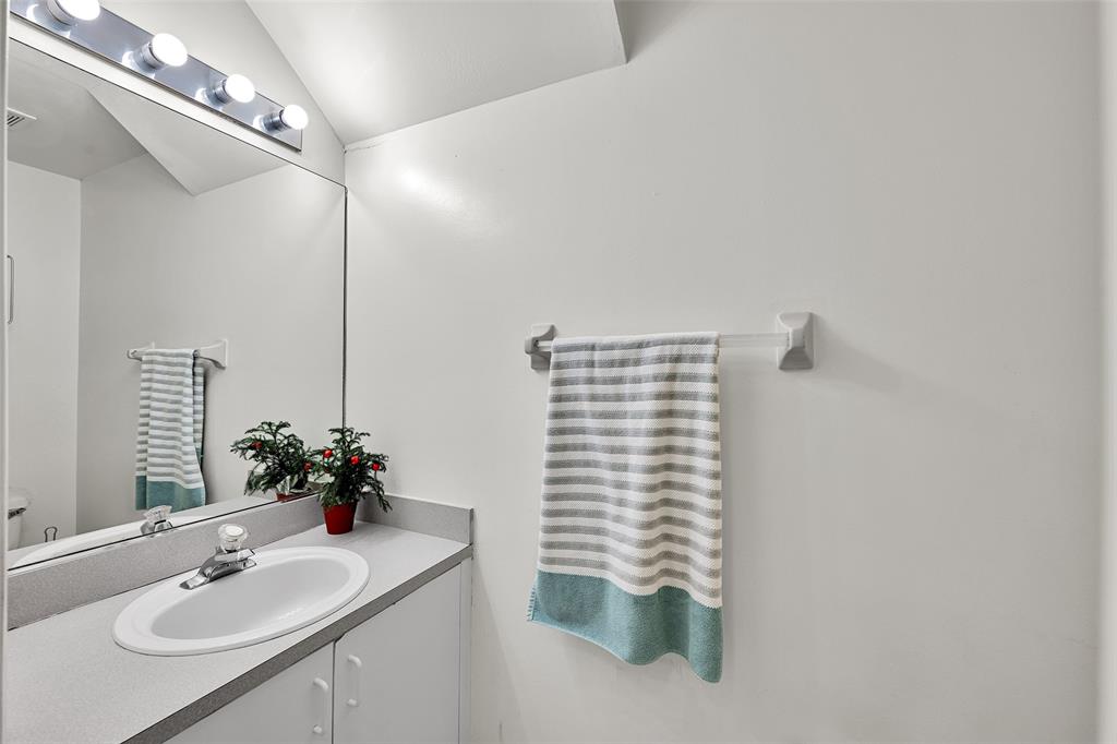 17332 Southwest 18th Street Miramar, FL 33029 - Photo 21 of 43 a bathroom with a sink and a mirror