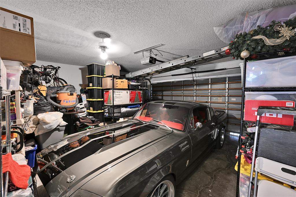 17332 Southwest 18th Street Miramar, FL 33029 - Photo 42 of 43 a room with lots of storage and a fan