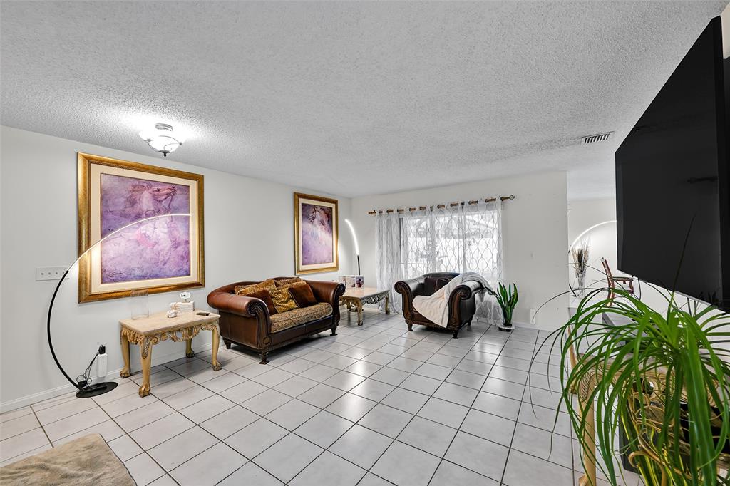 17332 Southwest 18th Street Miramar, FL 33029 - Photo 5 of 43 a living room with furniture
