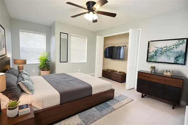 a bedroom with a bed and furniture