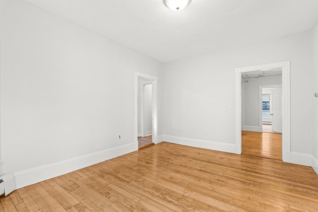 22 Royal Street Boston, MA 02134 - Photo 25 of 42 a view of empty room with wooden floor
