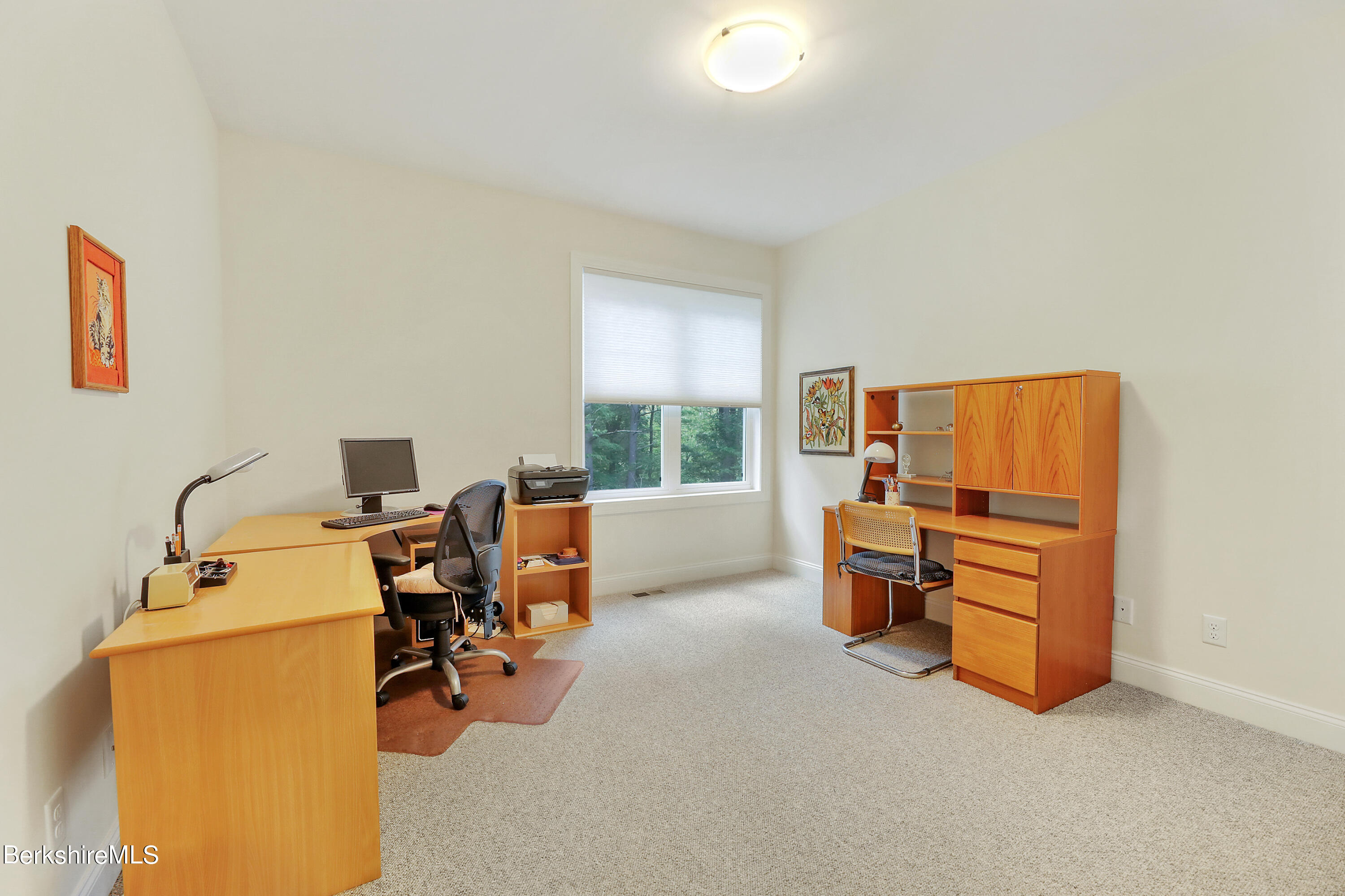 16 Spruce Trail, Unit 16 Lenox, MA 01240 - Photo 21 of 33 a view of a workspace with furniture and a window