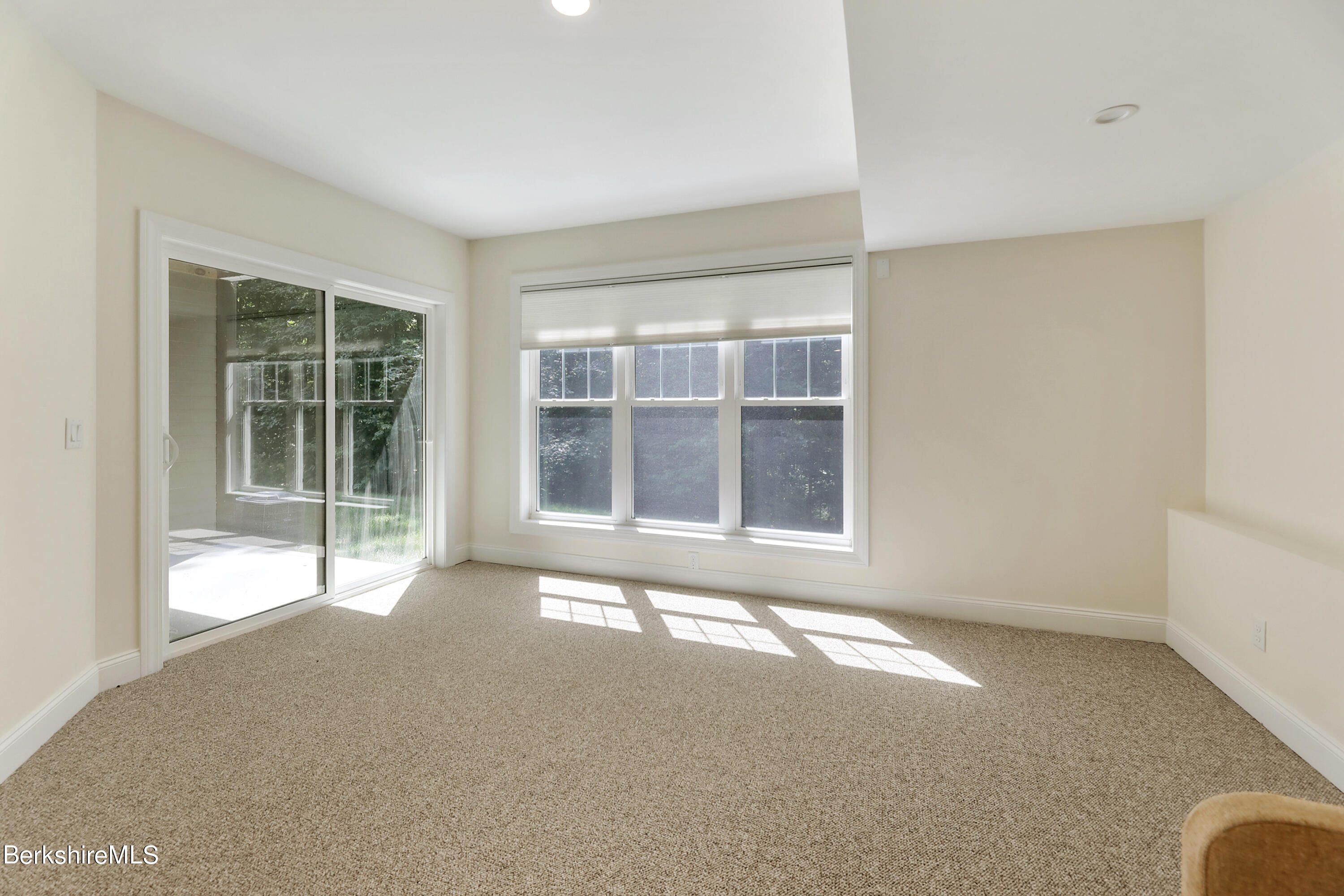 16 Spruce Trail, Unit 16 Lenox, MA 01240 - Photo 26 of 33 a view of an empty room with a window
