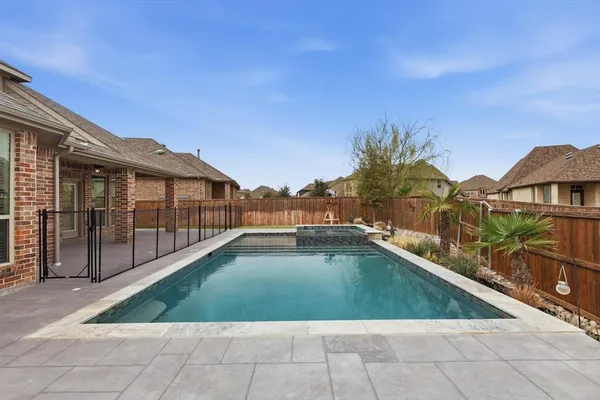 a view of swimming pool from a balcony
