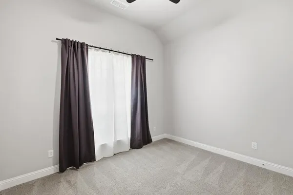 an empty room with closet