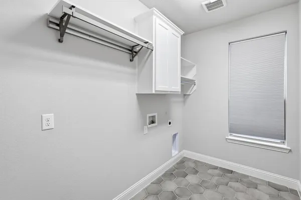 a view of a room with racks on the wall