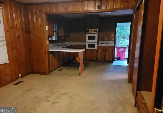 a view of kitchen and utility room