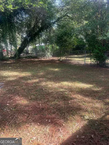 a view of outdoor space and yard