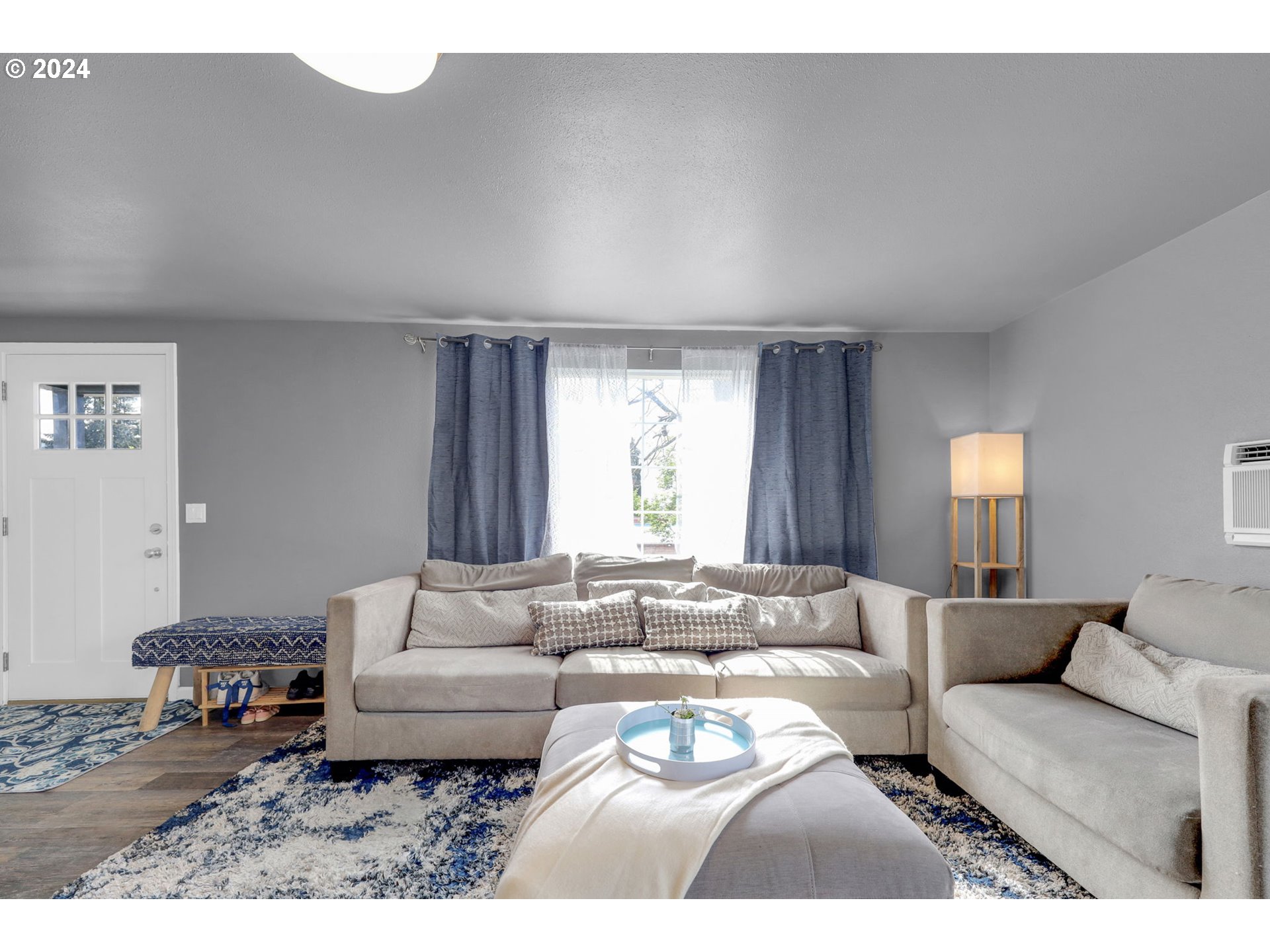 155 South 71st Street Springfield, OR 97478 - Photo 11 of 45 a living room with furniture and a large window