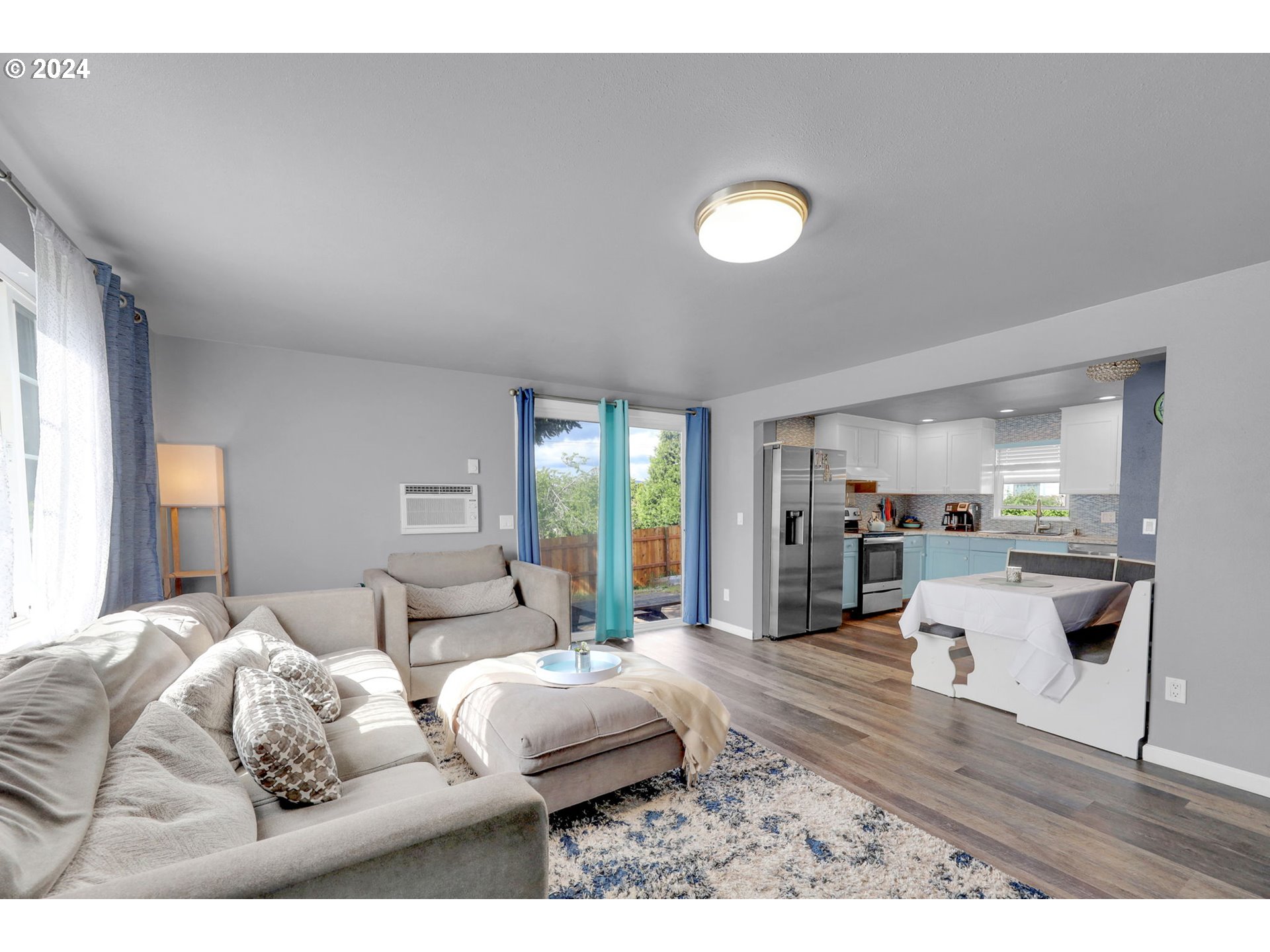 155 South 71st Street Springfield, OR 97478 - Photo 16 of 45 a living room with furniture and a large window