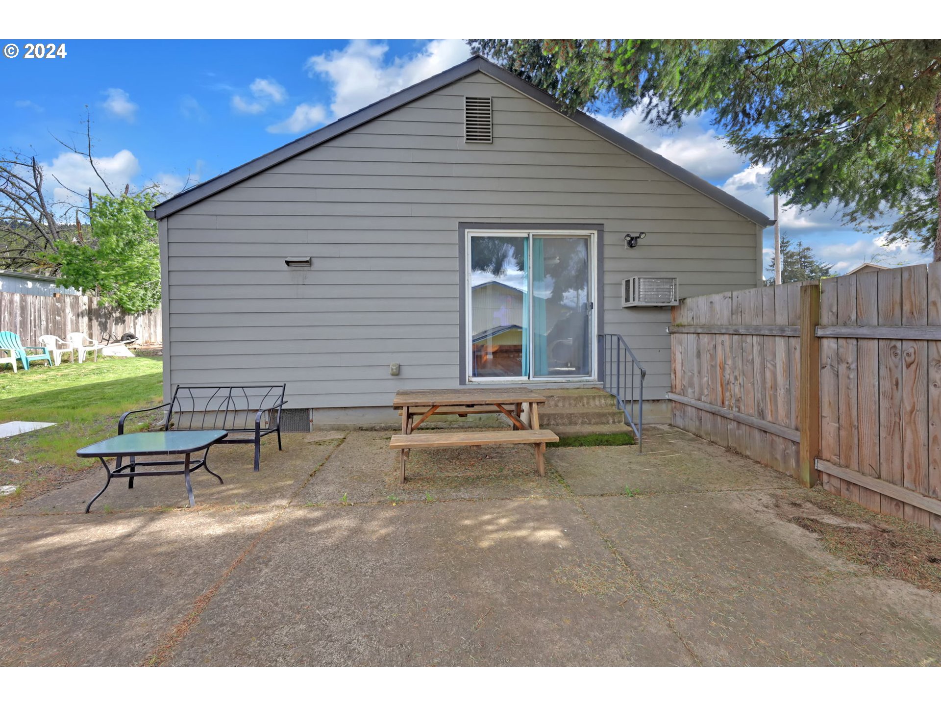155 South 71st Street Springfield, OR 97478 - Photo 42 of 45 a view of a house with backyard and sitting area