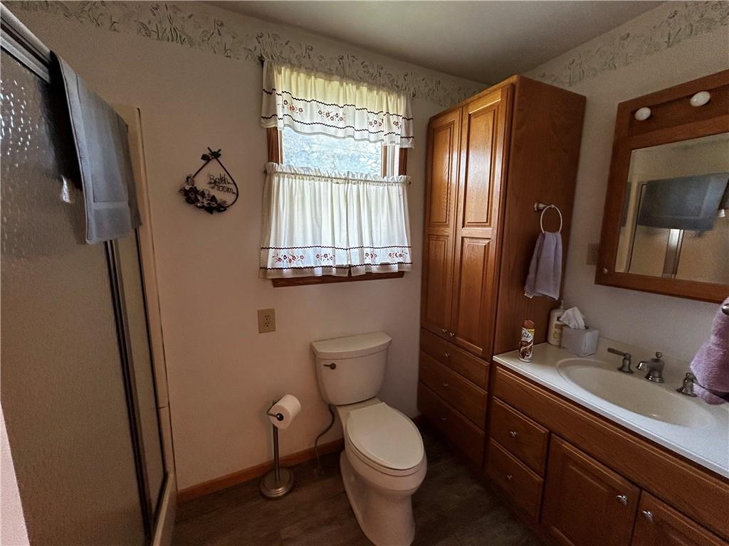 171 9th Street New Florence, PA 15944 - Photo 11 of 18 a bathroom with a granite countertop toilet sink and mirror