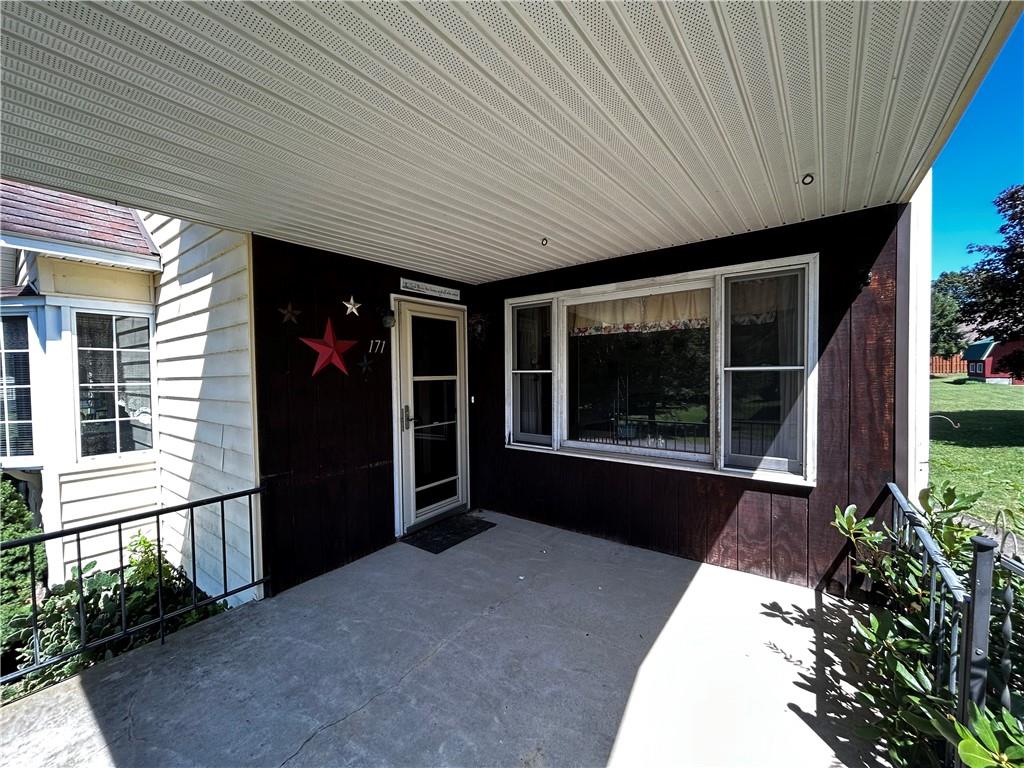 171 9th Street New Florence, PA 15944 - Photo 4 of 18 a living room with a large window and a potted plant