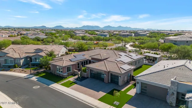 a aerial view of a house with a big yard