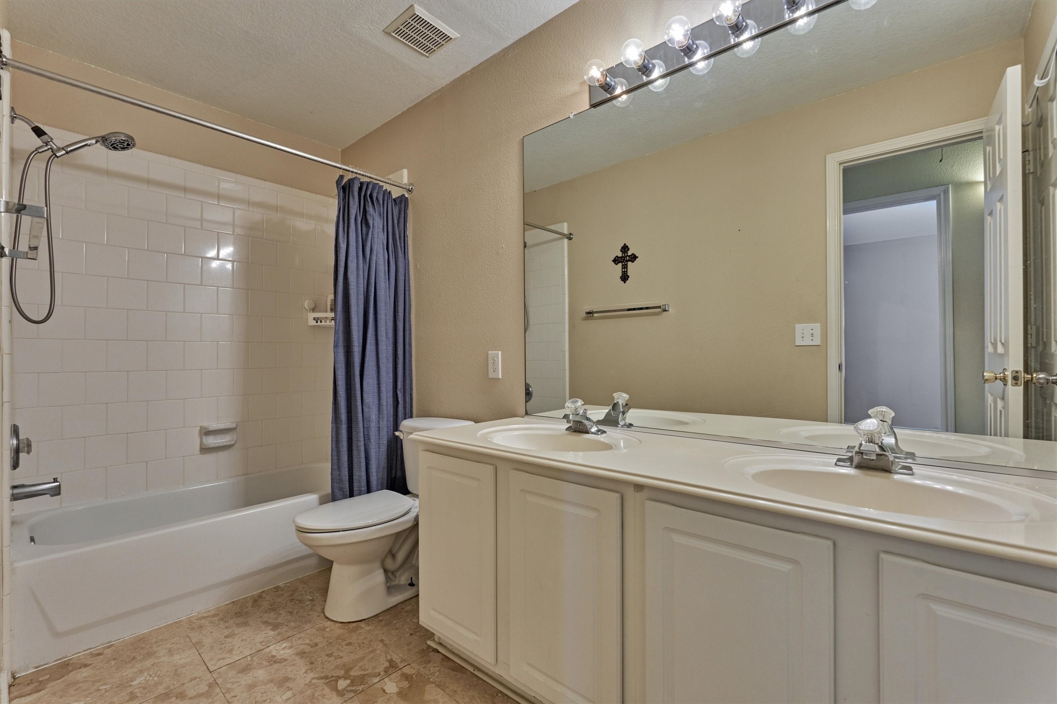 20835 Louetta Oak Drive Spring, TX 77388 - Photo 17 of 37 a bathroom with a sink toilet tub and shower