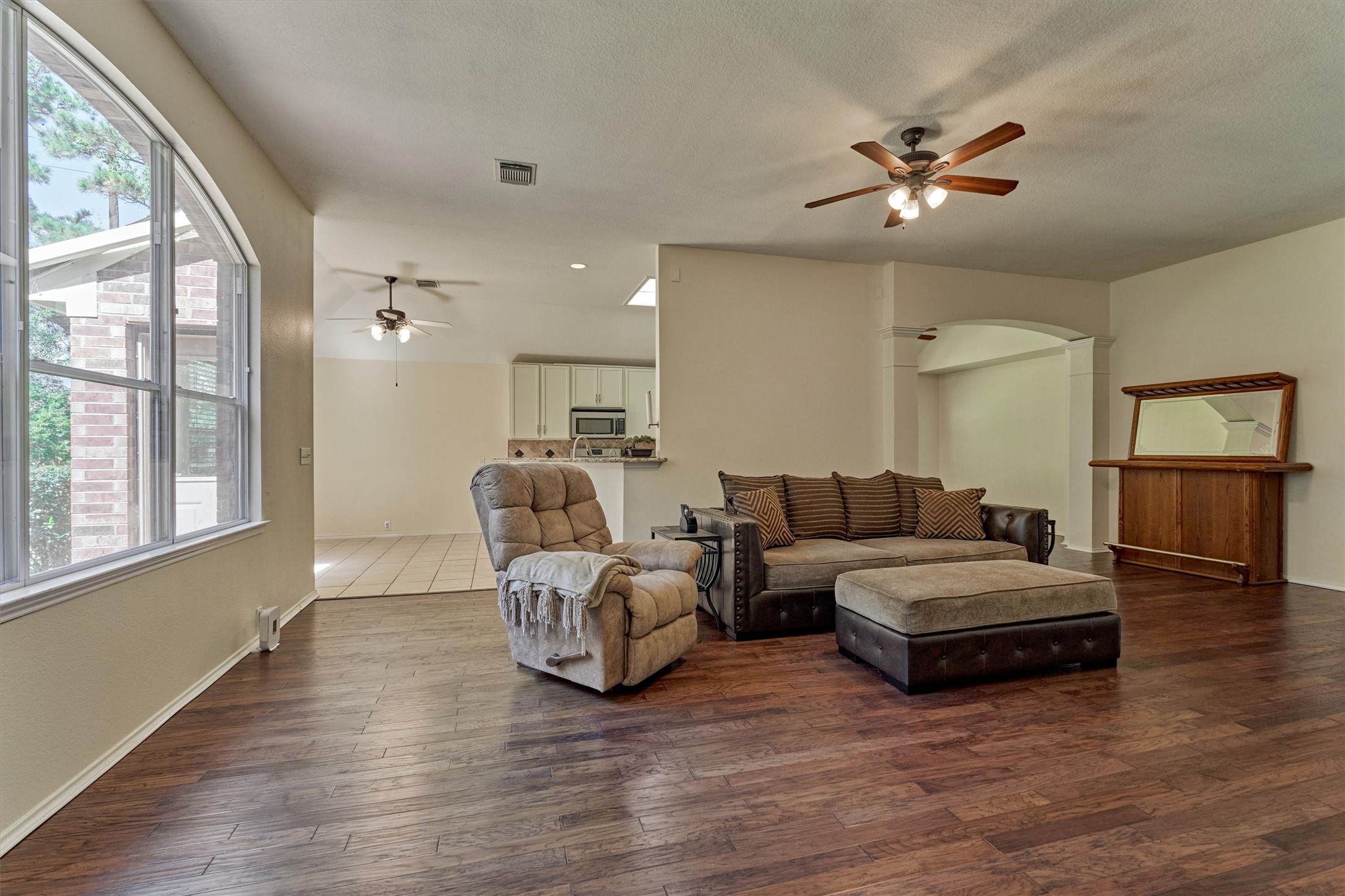 20835 Louetta Oak Drive Spring, TX 77388 - Photo 23 of 37 a living room with furniture and a large window