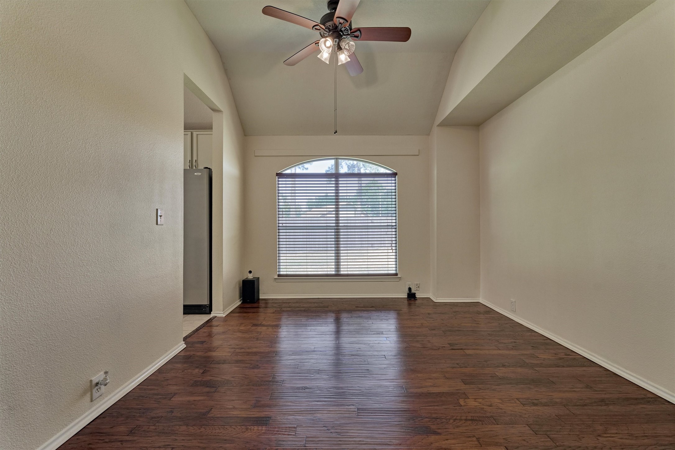 20835 Louetta Oak Drive Spring, TX 77388 - Photo 24 of 37 wooden floor in an empty room with a window