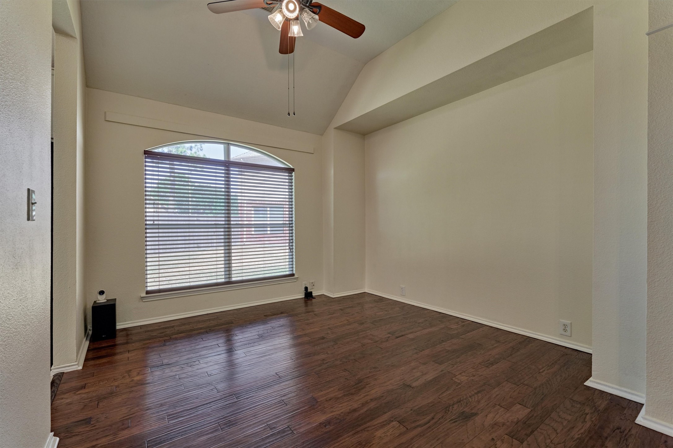 20835 Louetta Oak Drive Spring, TX 77388 - Photo 25 of 37 an empty room with wooden floor and windows