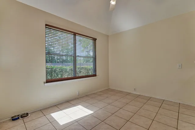 a view of an empty room with window