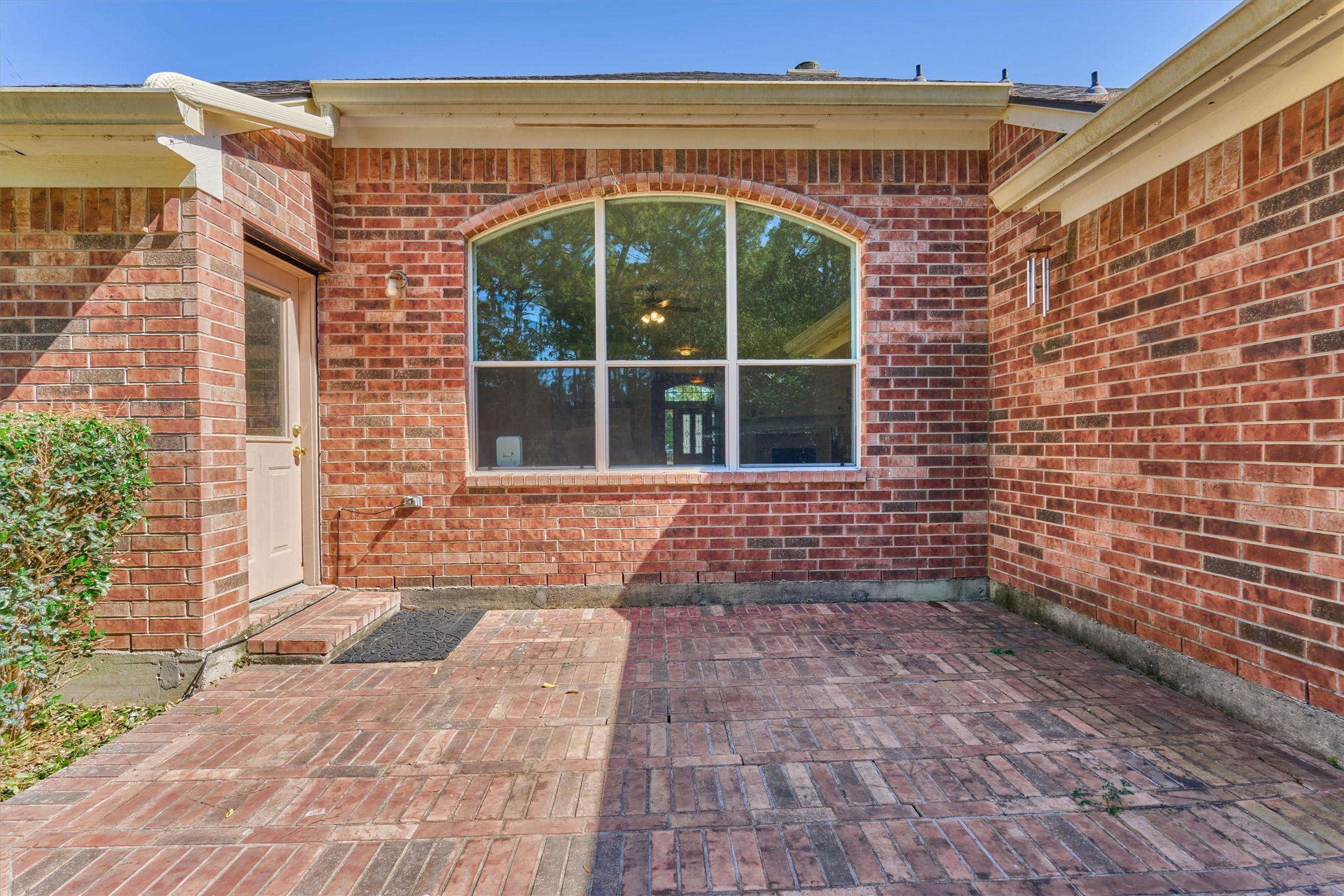 20835 Louetta Oak Drive Spring, TX 77388 - Photo 39 of 39 a view of a brick house with a large window