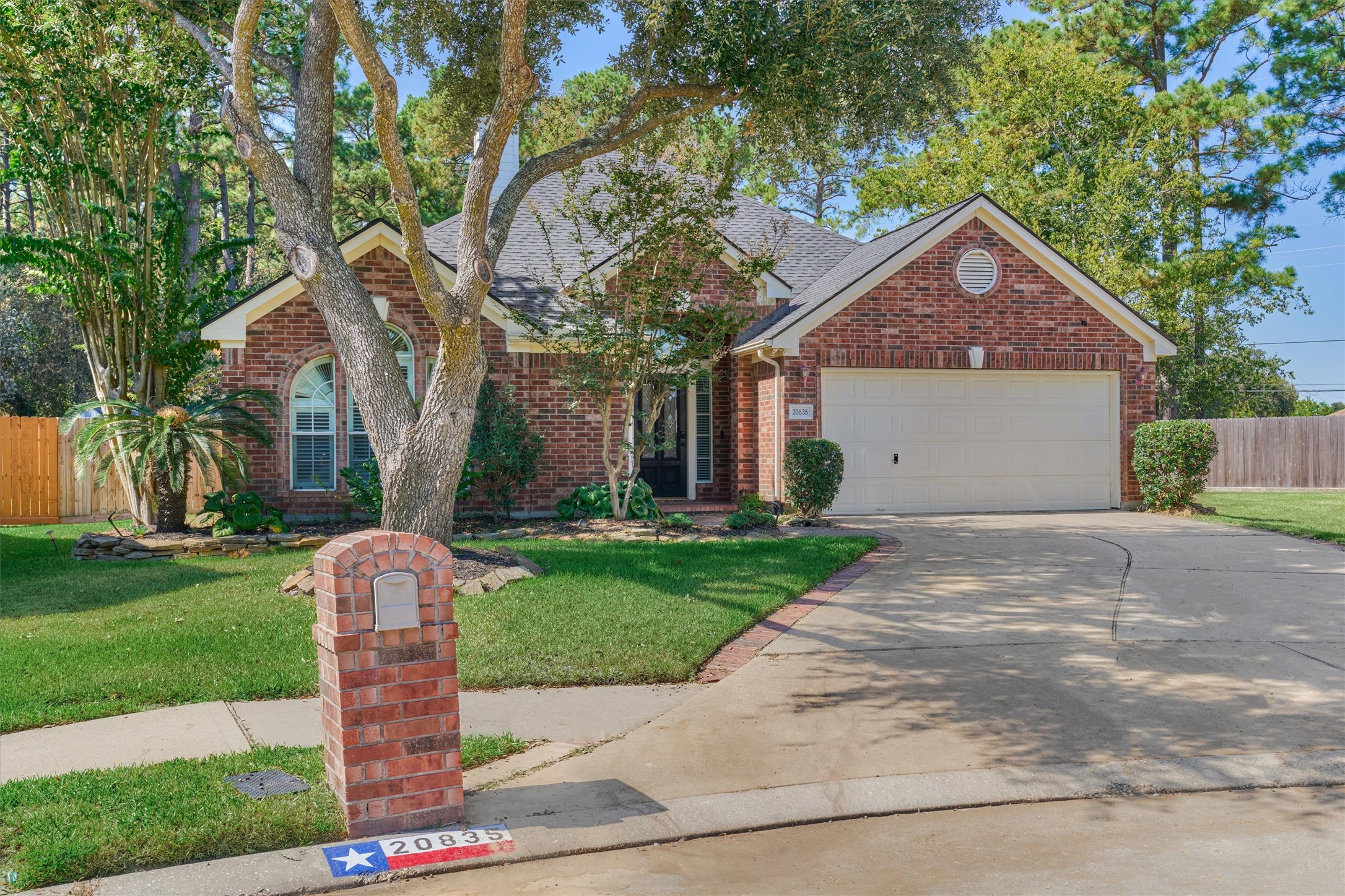 20835 Louetta Oak Drive Spring, TX 77388 - Photo 7 of 39 a front view of a house with a yard and large tree