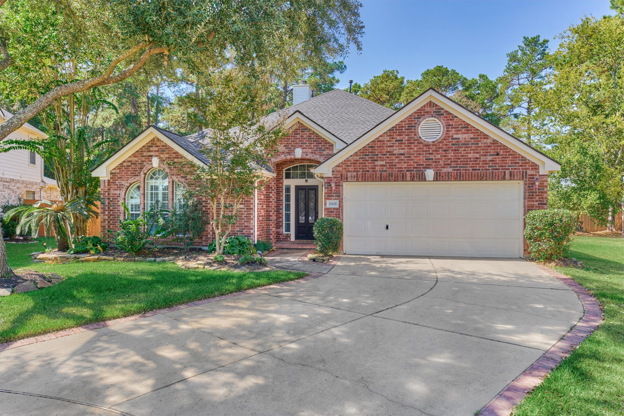 20835 Louetta Oak Drive Spring, TX 77388 - Photo 8 of 39 a front view of a house with a yard and garage